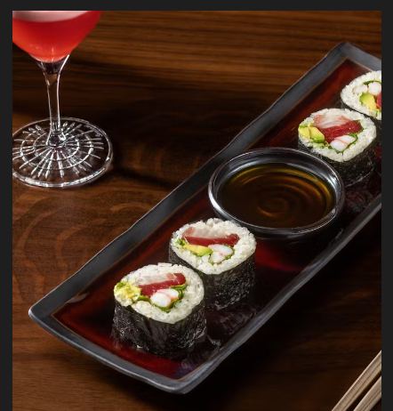 Sushi roll plate and cocktail at WAKUDA